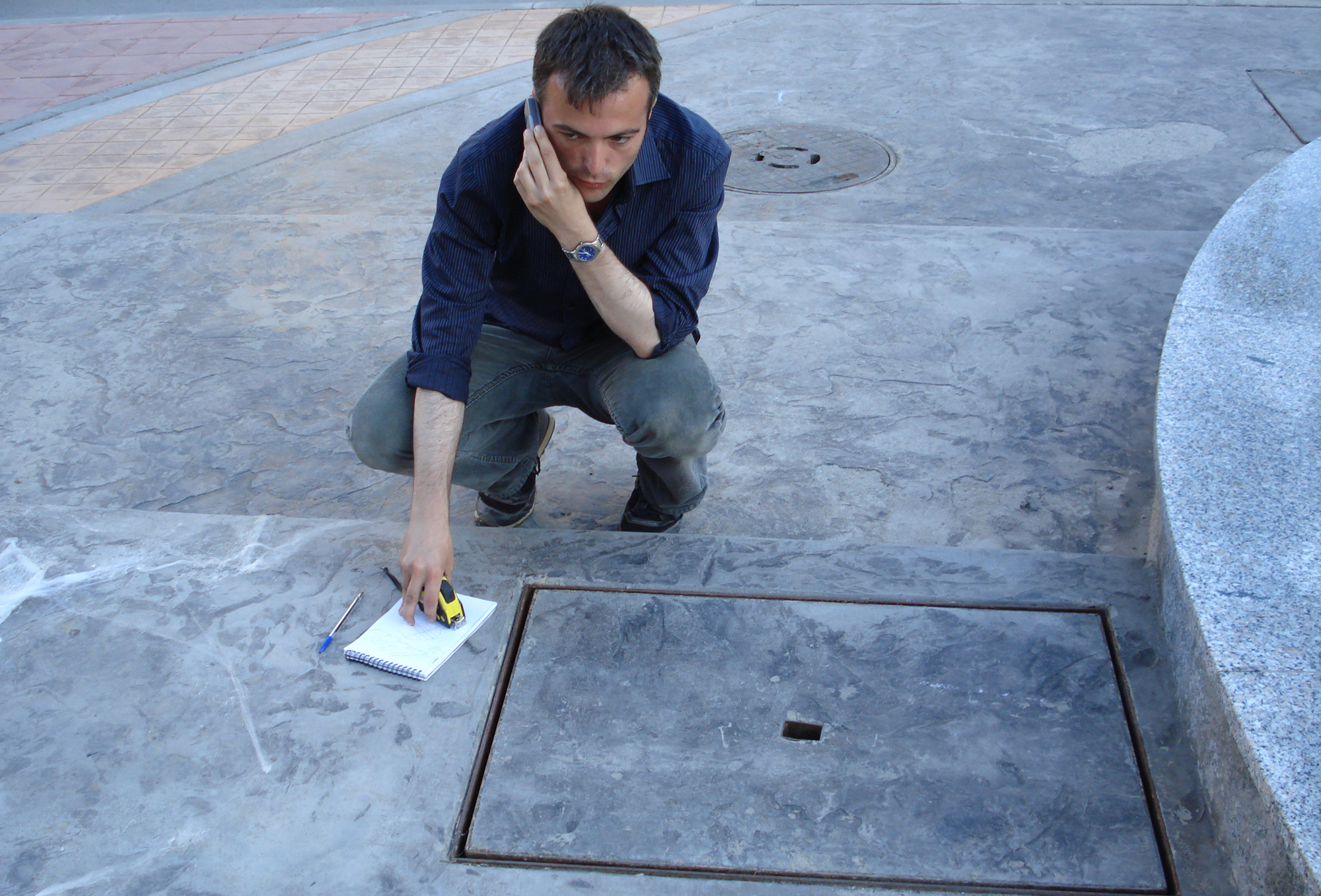 Location scouting — notebook on pavement