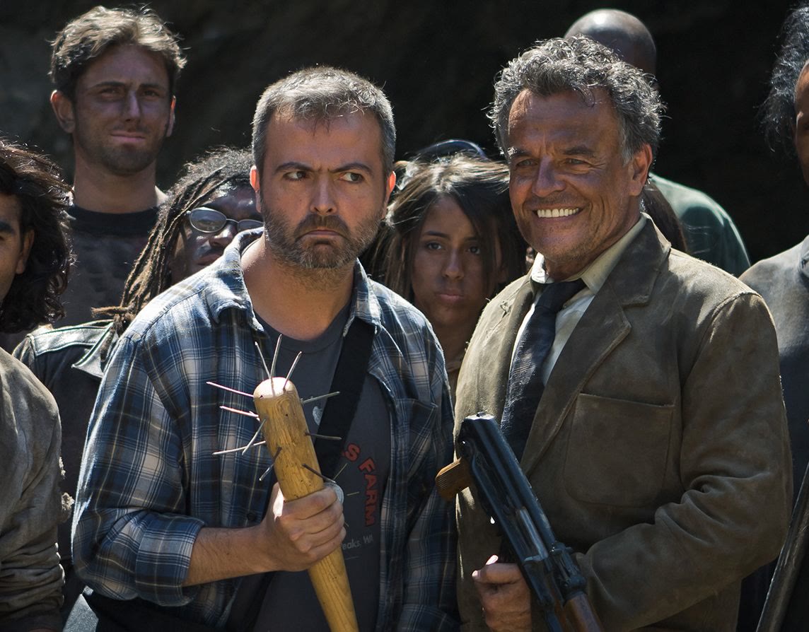 Cast in costume on the cave set.